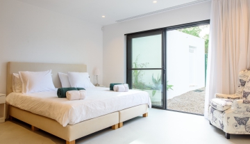 Resa Estates Ibiza villa for sale es Cubells modern heated pool bedroom 1.jpg